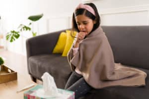 Little girl with the flu in kida