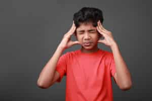 Little boy with a migraine - in kids.