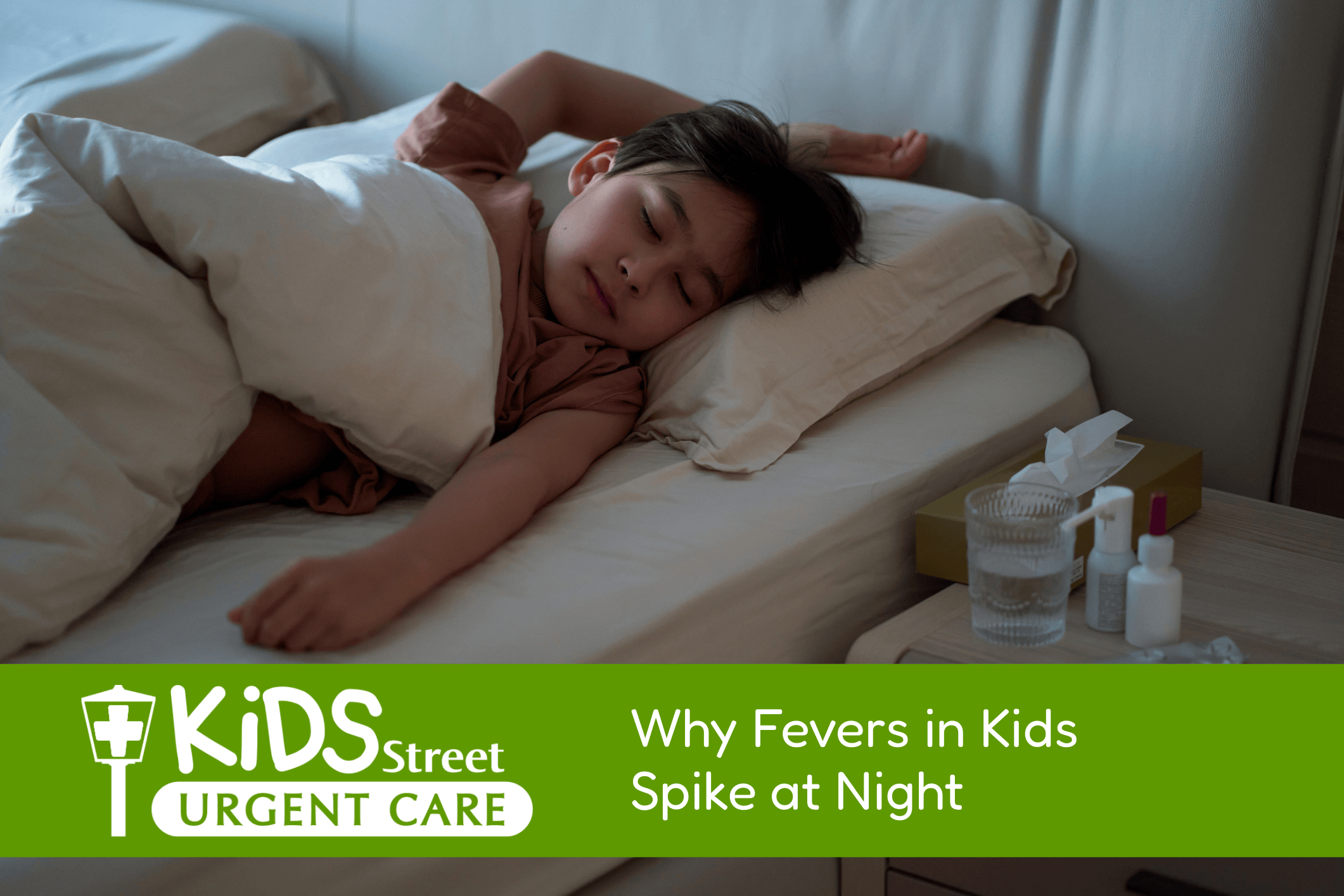 Little boy lying on his bed at night with a fever.