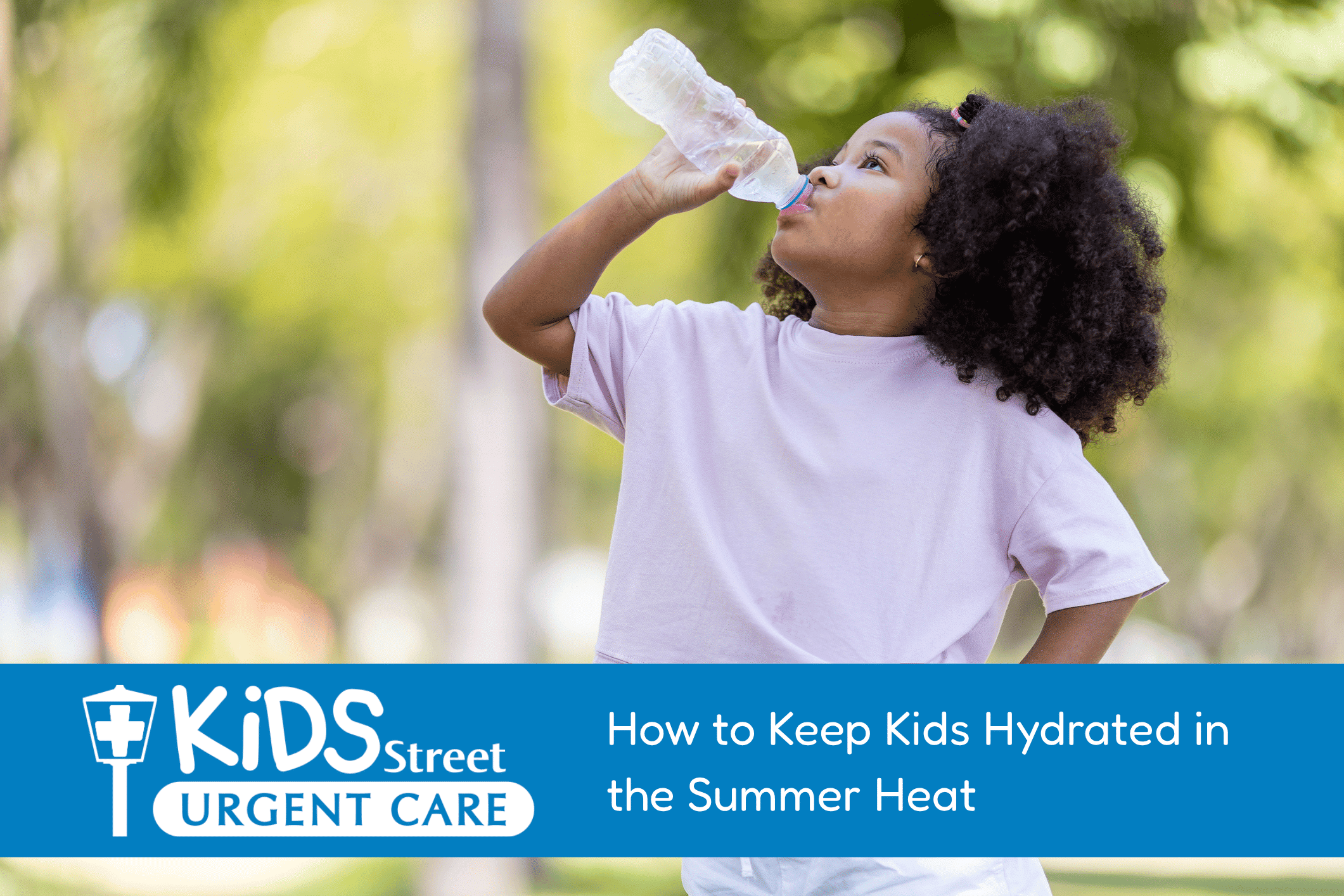 Little girl drinking a bottle of water as a featured image for KidsStreet Urgent care hydration blog.